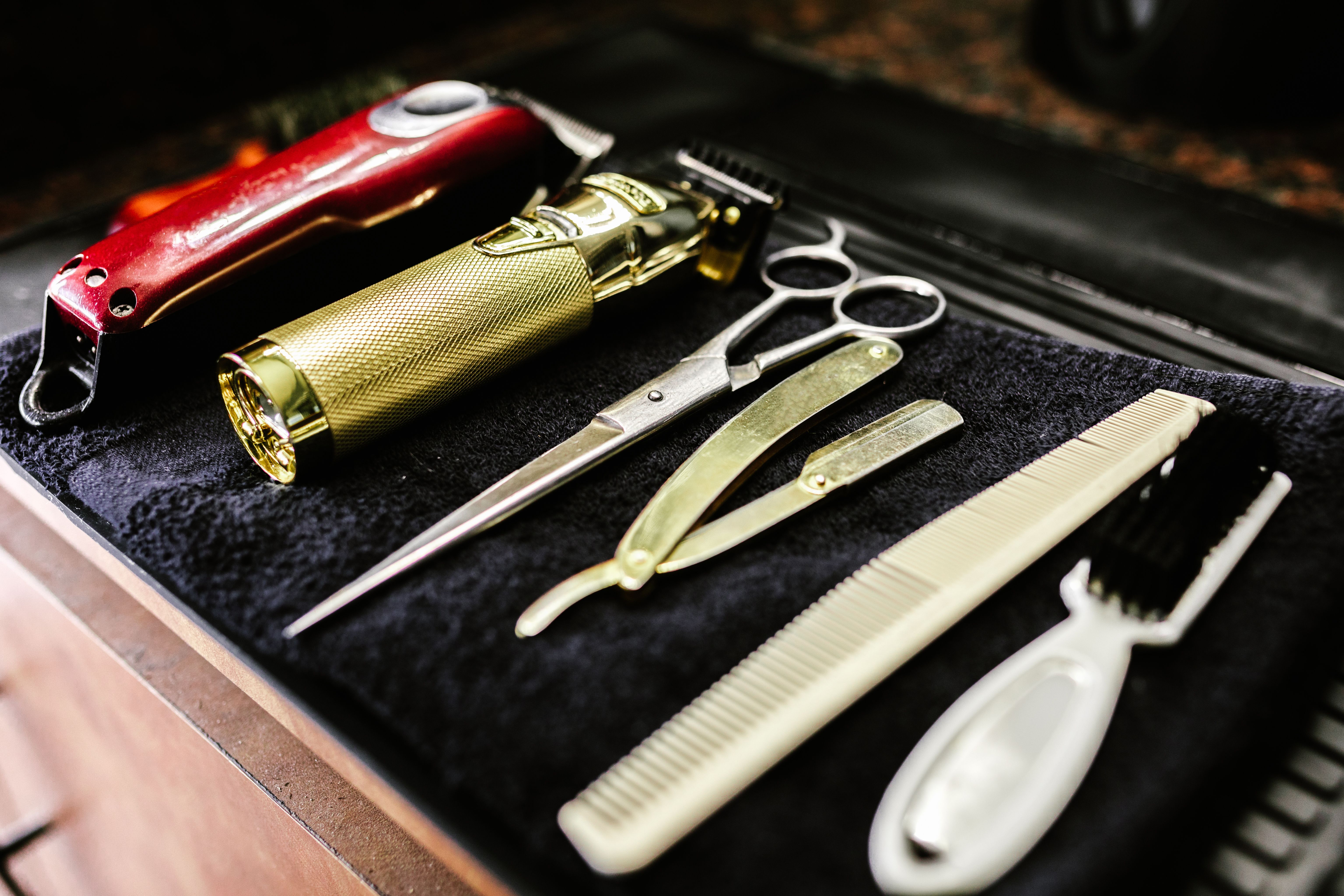 Barber tools laid out on a station